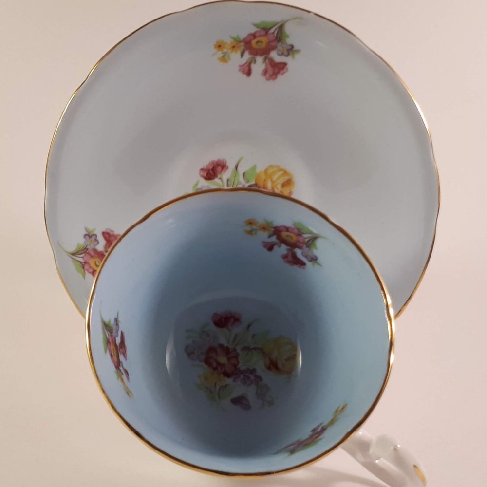 Vintage Unique Royal Stafford blue Wide mouth teacup and saucer.